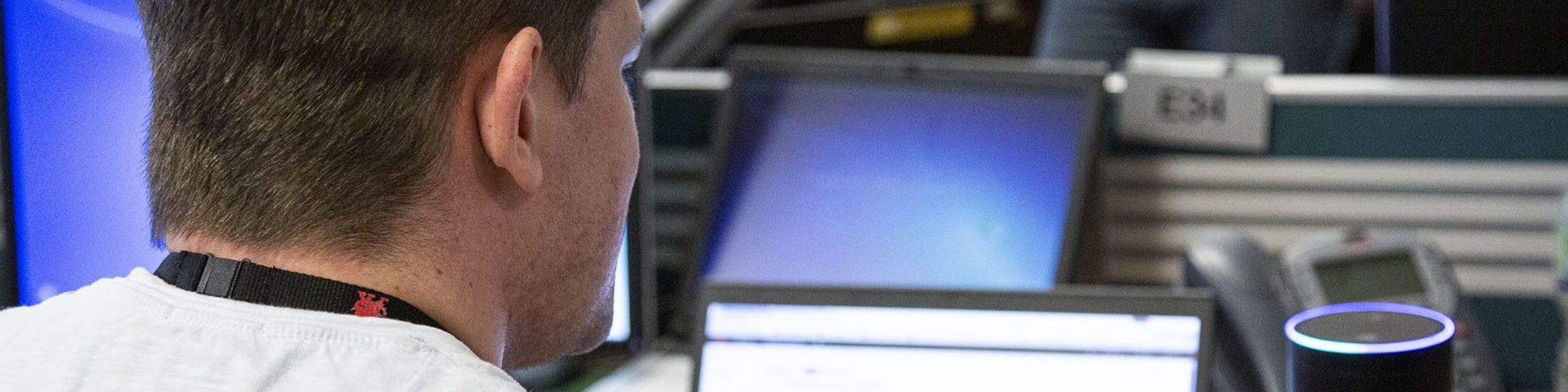 DfT Digital professional using a laptop.