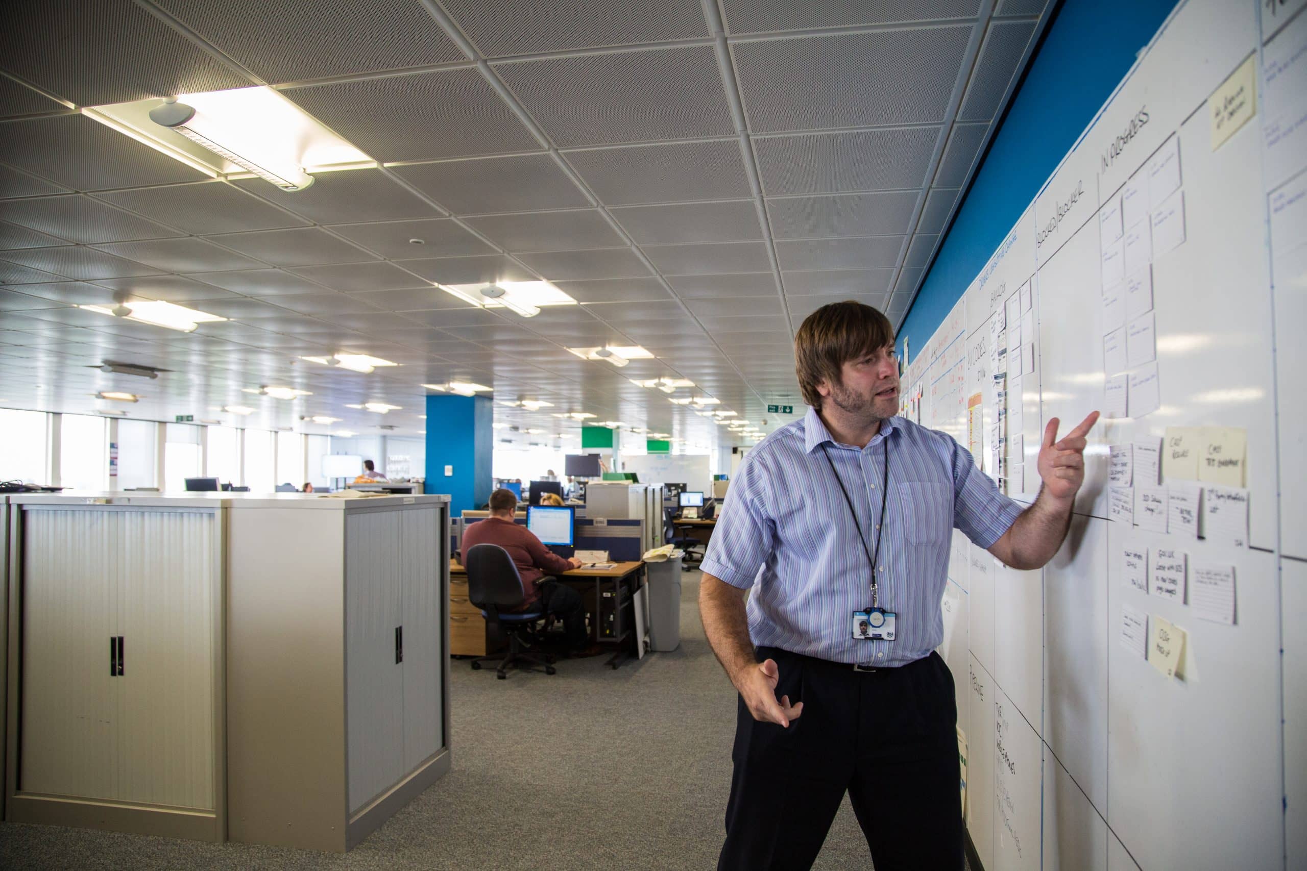 DfT Project Delivery professional presenting to colleagues.