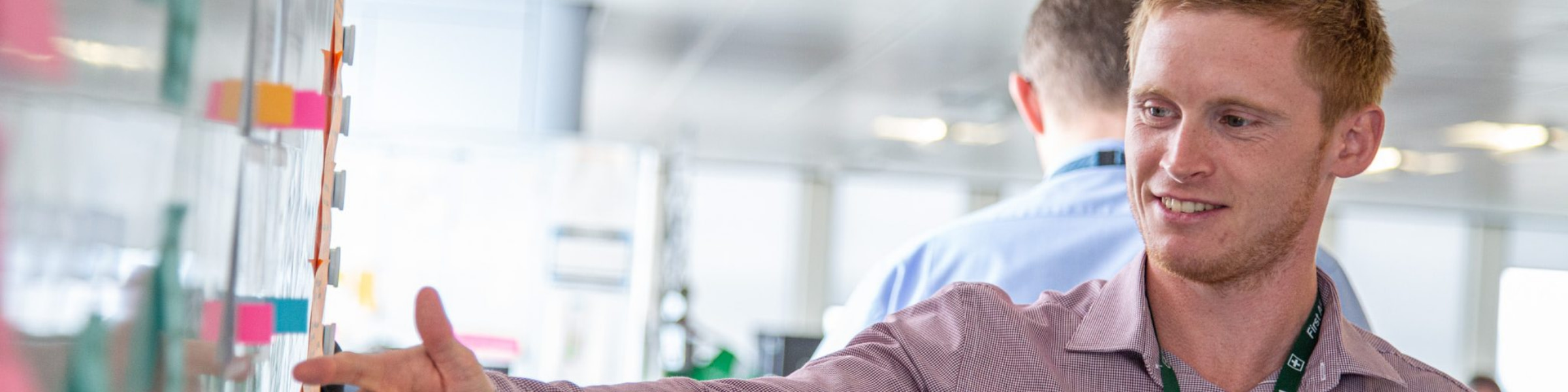 A DfT Statistician conducting a whiteboard presentation.